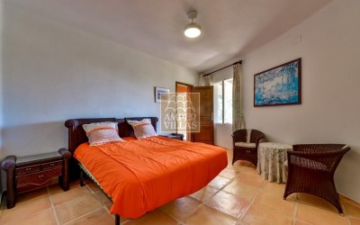 A beautiful villa in a peaceful, green setting.