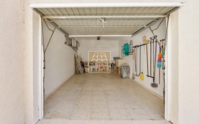 A beautiful villa in a peaceful, green setting.